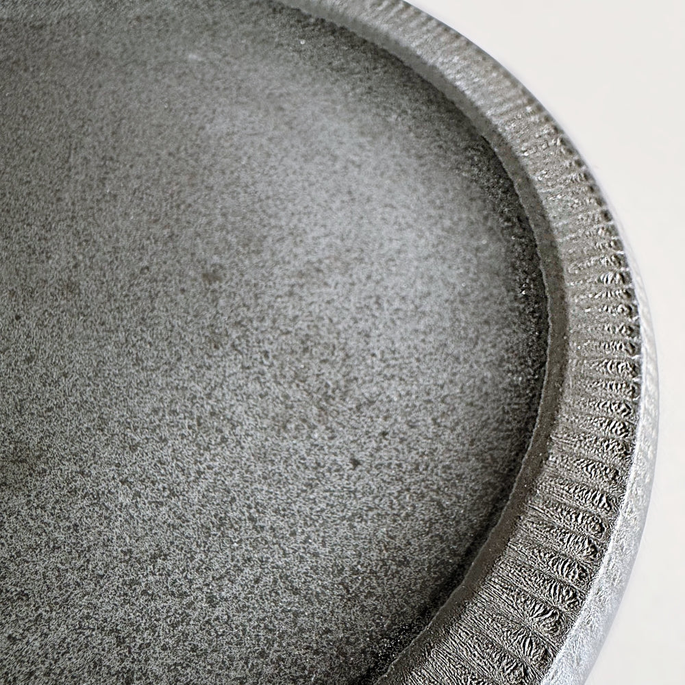 Black matt glazed dinner plate. Made in Japan, Mino Ware. Available at Toka Ceramics.