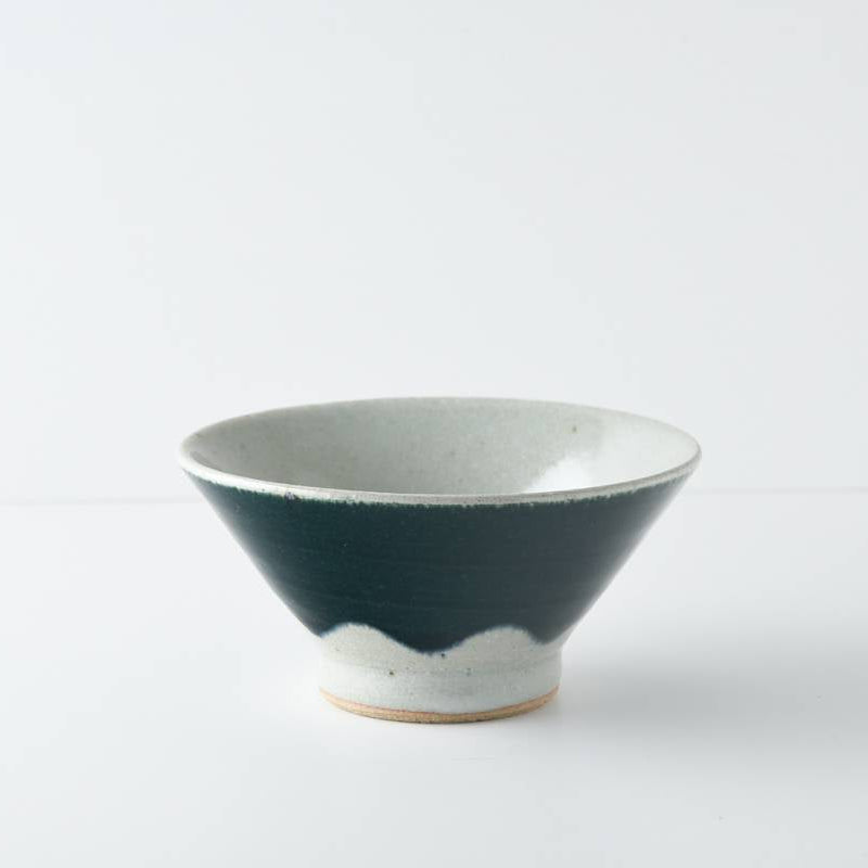 Blue and white ceramic bowl on a white background