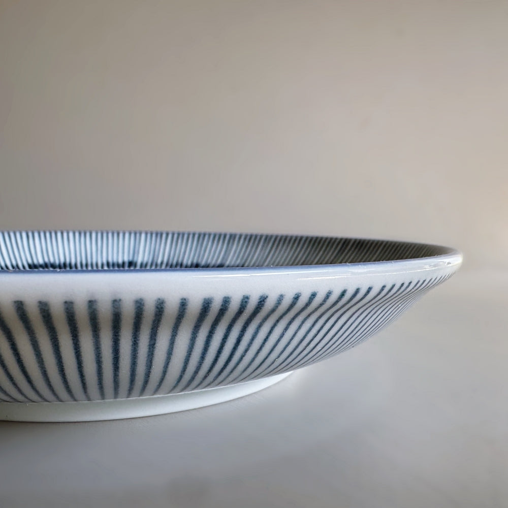Japanese porcelain plate with blue Tokusa pattern. Made in Japan, Mino ware. Available at Toka Ceramics.