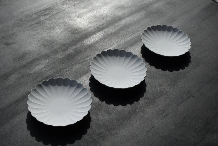 1616 arita/japan TY palace plate 110, chrysanthemum shaped plate, matt grey in colour. Arita Ware. Made in Japan.