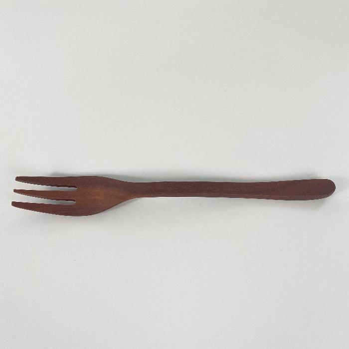 Natural wooden simple table fork from Toka Ceramics.
