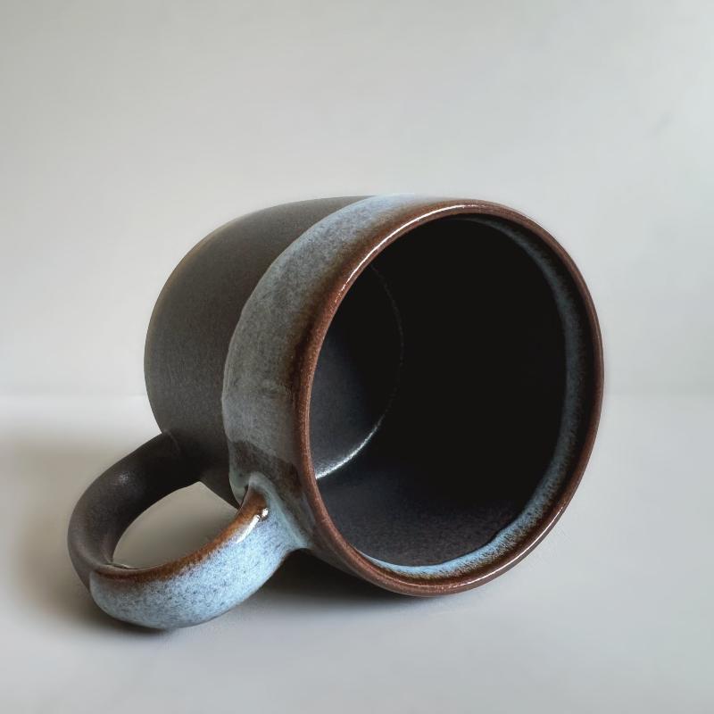 Handcrafted large porcelain TOKA mug in black with a large handle. Made in Japan. 