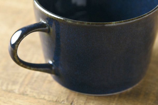 Japanese coffee mug in dusty blue glaze. Made in Gifu prefecture, Japan. Mino Ware. Available at Toka Ceramics.