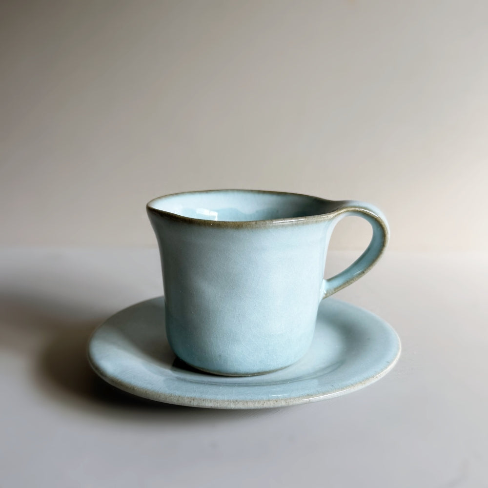 Japanese porcelain cup and saucer set in sky blue glaze. Made in Japan, Mino Ware. Available at Toka Ceramics.