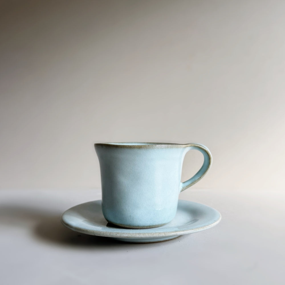 Japanese porcelain cup and saucer set in sky blue glaze. Made in Japan, Mino Ware. Available at Toka Ceramics.