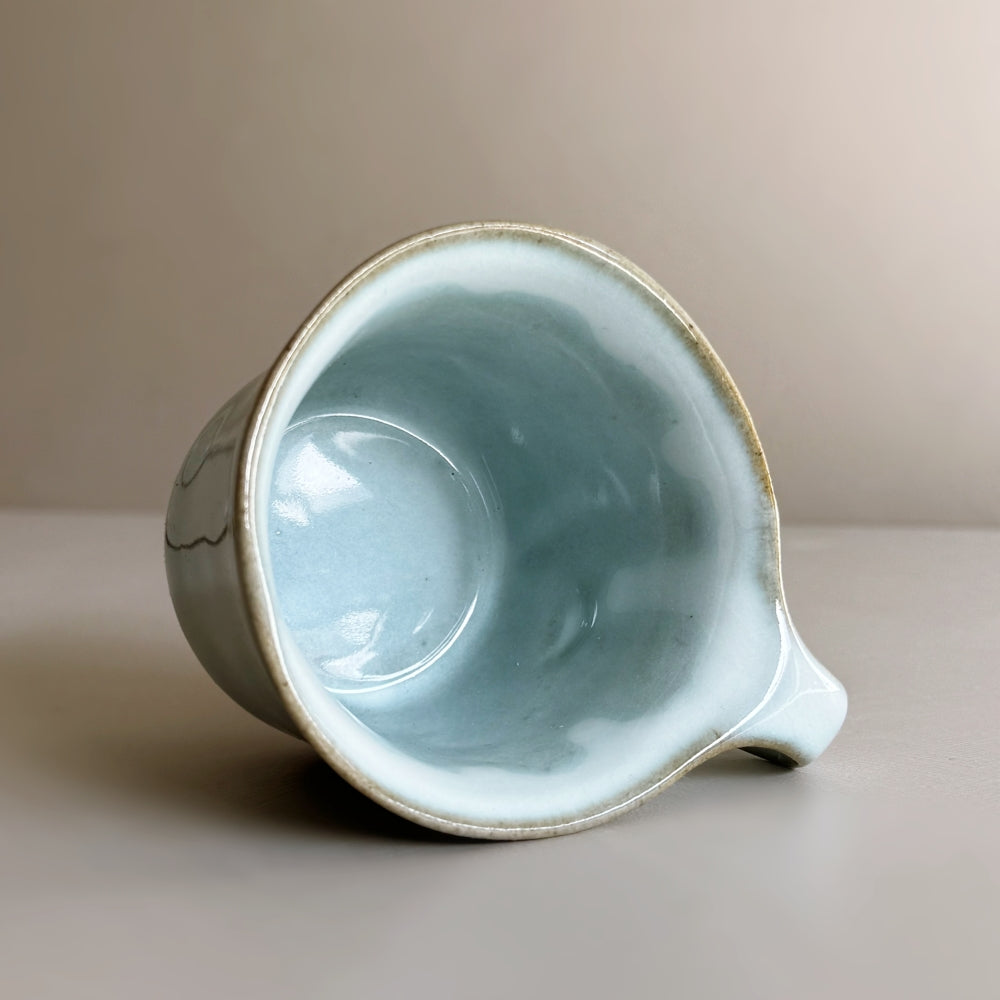 Japanese porcelain cup and saucer set in sky blue glaze. Made in Japan, Mino Ware. Available at Toka Ceramics.