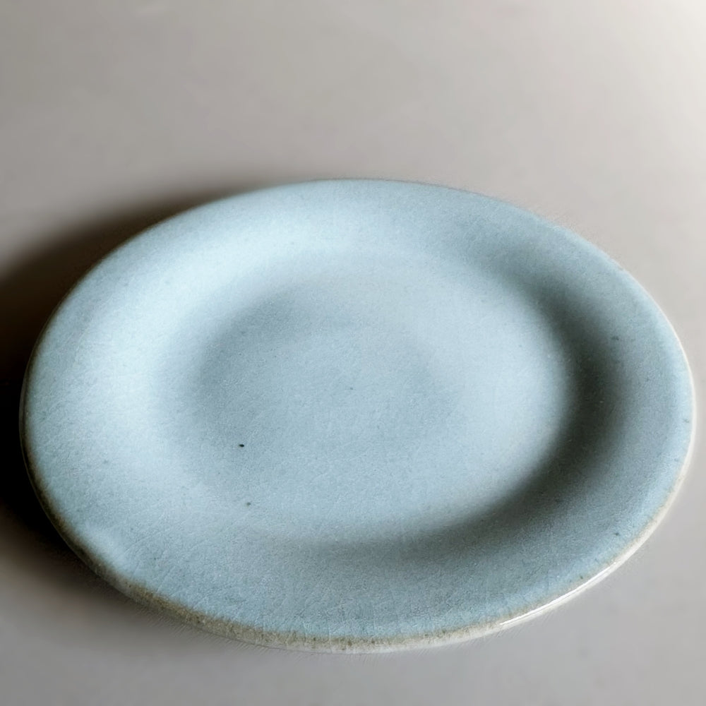 Japanese porcelain cup and saucer set in sky blue glaze. Made in Japan, Mino Ware. Available at Toka Ceramics.