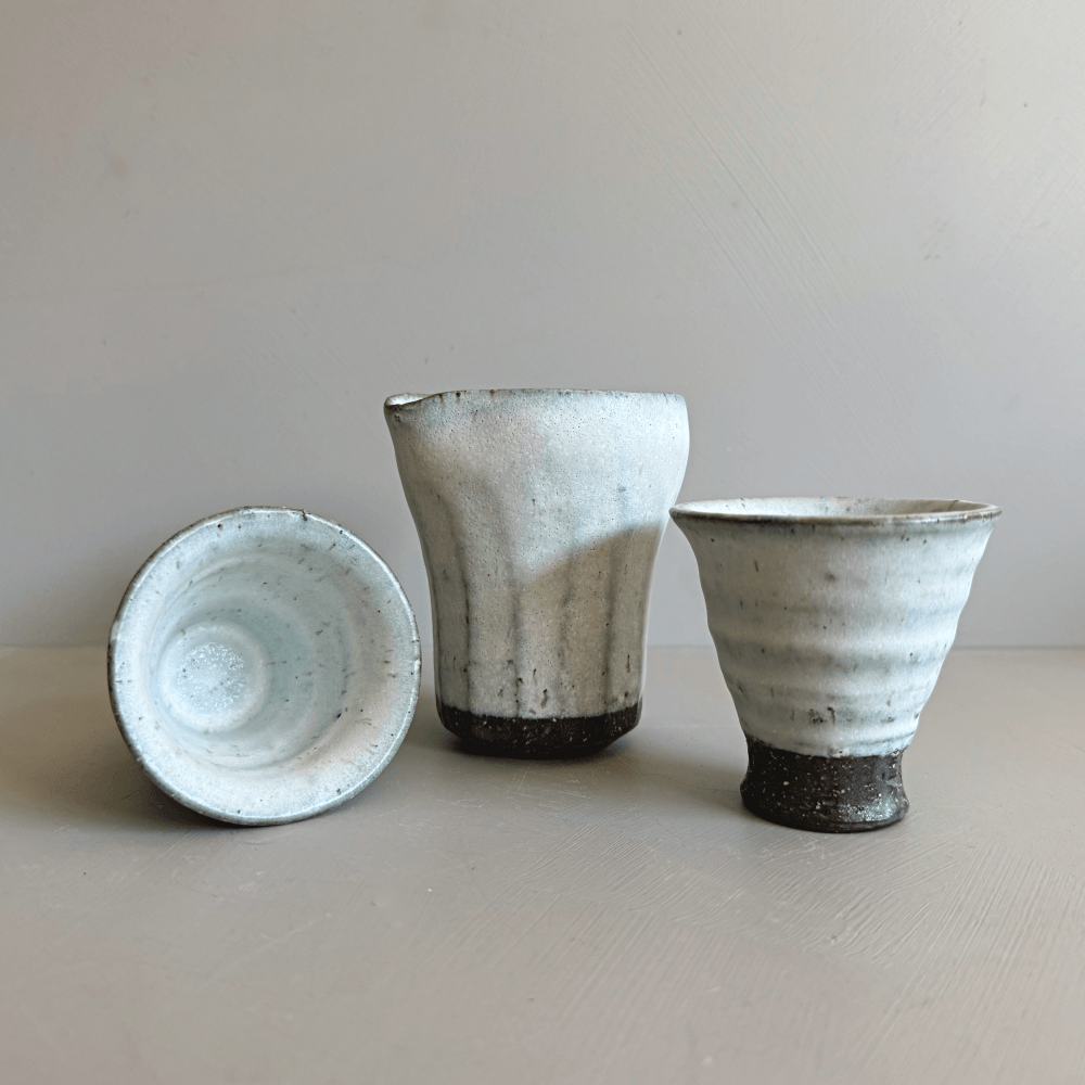 Japanese handcrafted sake set with 1 katakuchi pourer and 2 cups. Crafted by Shotoen in Gifu prefecture Japan. One of a kind pottery. Available at Toka Ceramics.