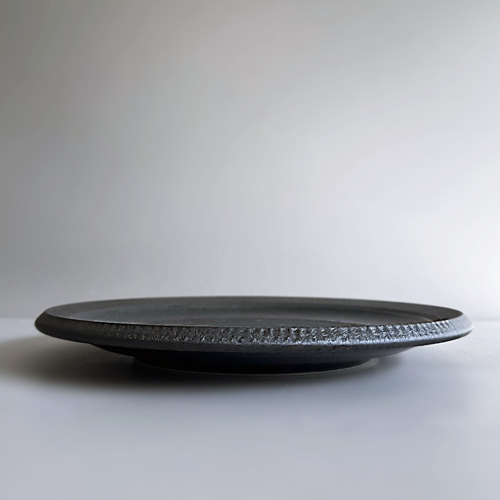 Black matt glazed dinner plate. Made in Japan, Mino Ware. Available at Toka Ceramics.