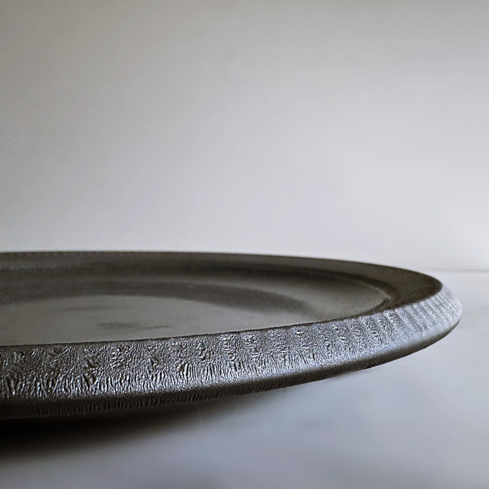 Black matt glazed dinner plate. Made in Japan, Mino Ware. Available at Toka Ceramics.