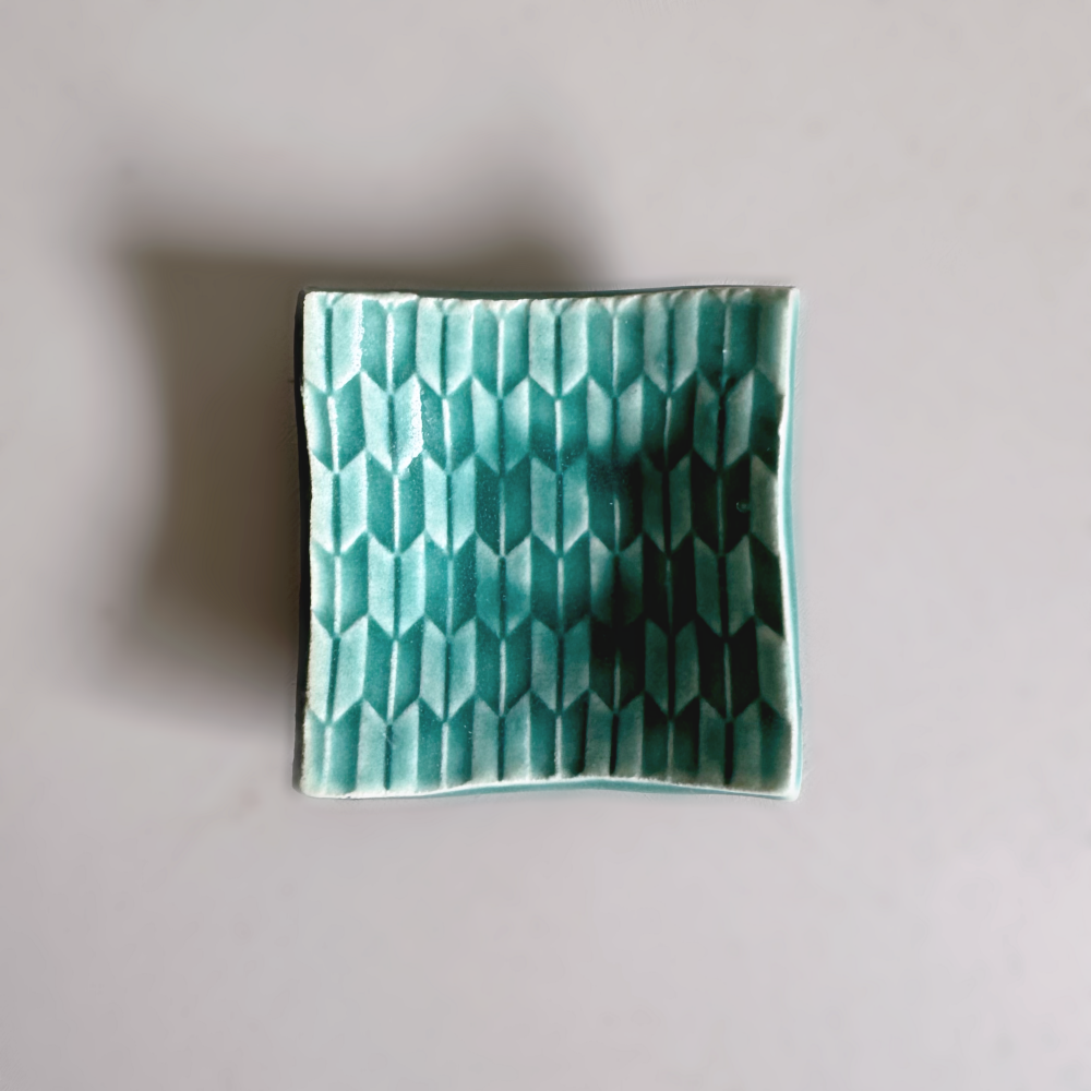 Japanese handcrafted mini curved plate, Mame zara in teal glaze colour by Shoyo Gama. Available at Toka Ceramics.