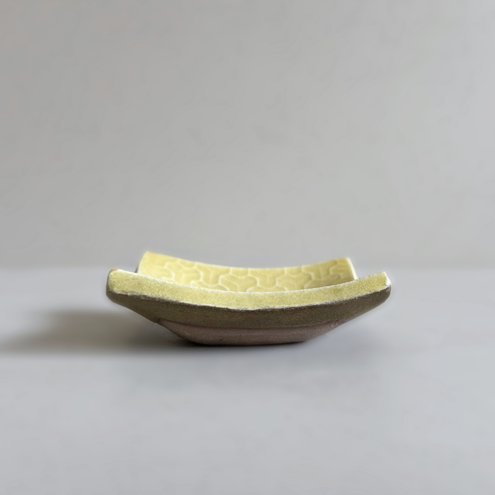 Japanese handcrafted mini curved plate, Mame zara in yuzu colour glaze by Shoyo Gama. Available at Toka Ceramics.