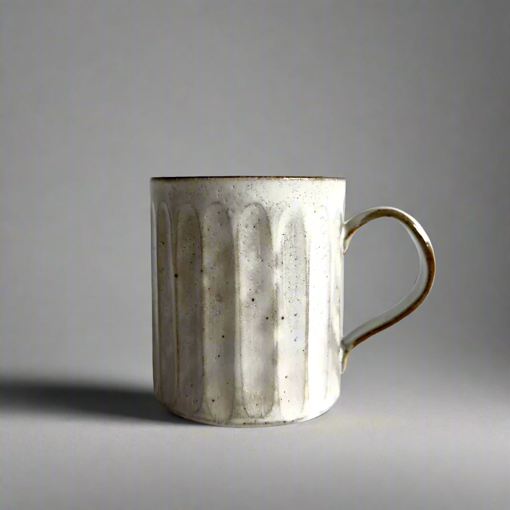 Japanese Kohiki glazed mug with Shinogi technique. Mino Ware, made in Japan. Available at Toka Ceramics.