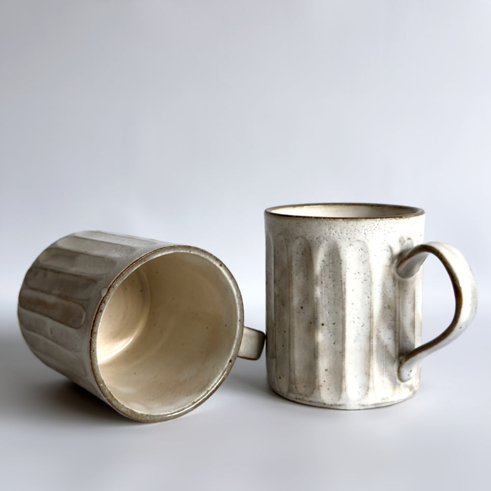 Japanese Kohiki glazed mug with Shinogi technique. Mino Ware, made in Japan. Available at Toka Ceramics.