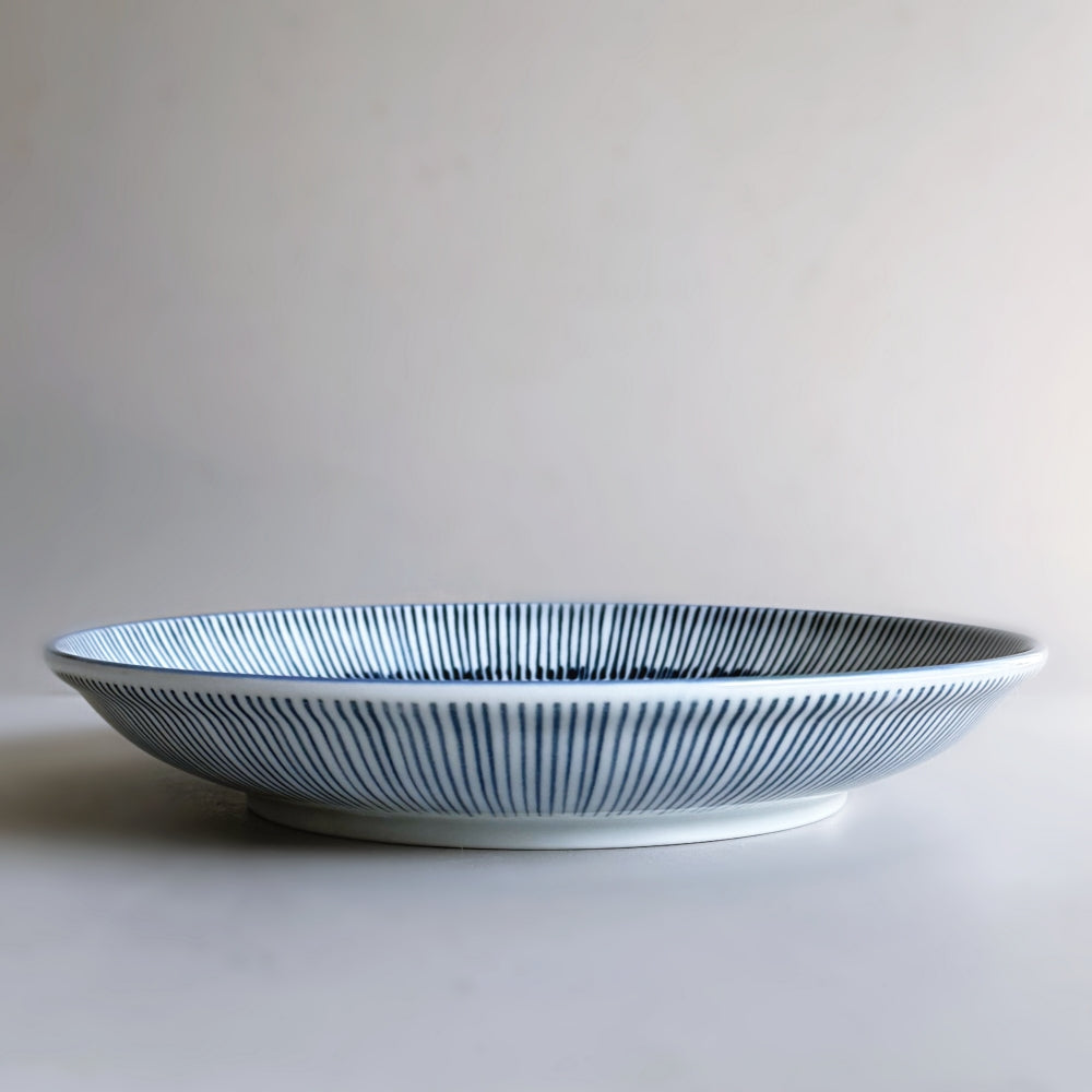 Japanese porcelain plate with blue Tokusa pattern. Made in Japan, Mino ware. Available at Toka Ceramics.
