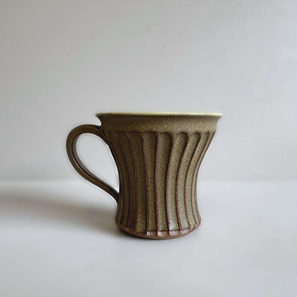 Japanese handcrafted pottery mug with shinogi pattern by Shoyo Gama. Available at Toka Ceramics.