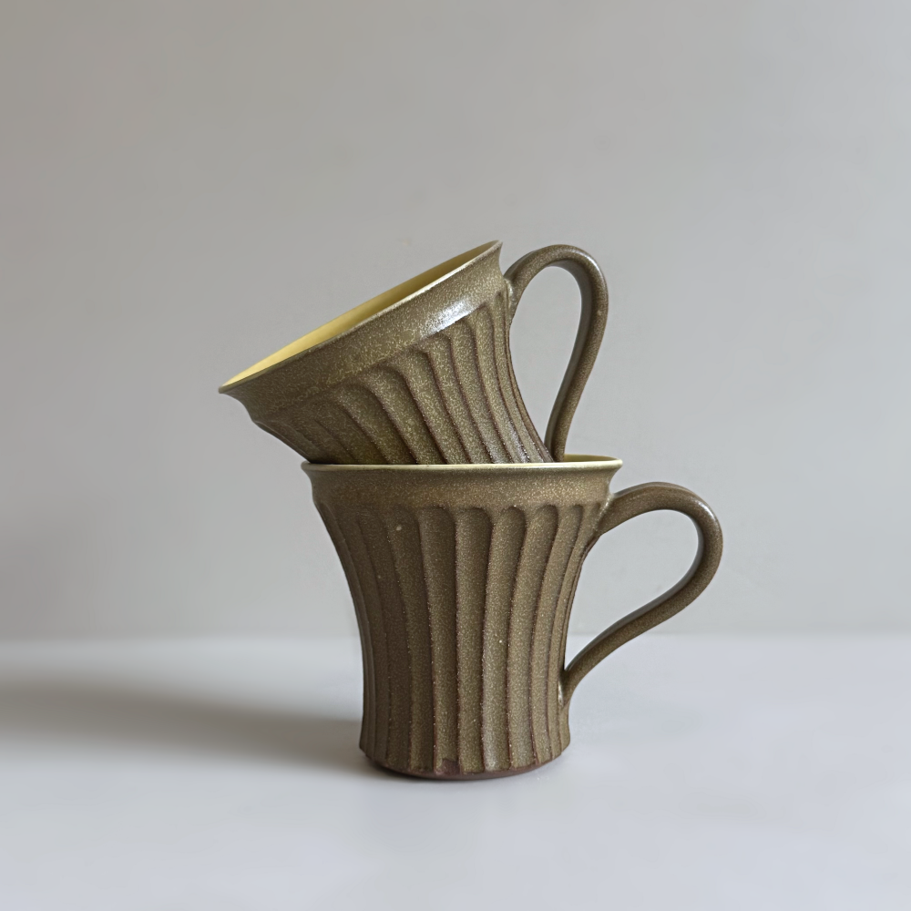 Japanese handcrafted pottery mug with shinogi pattern by Shoyo Gama. Available at Toka Ceramics.