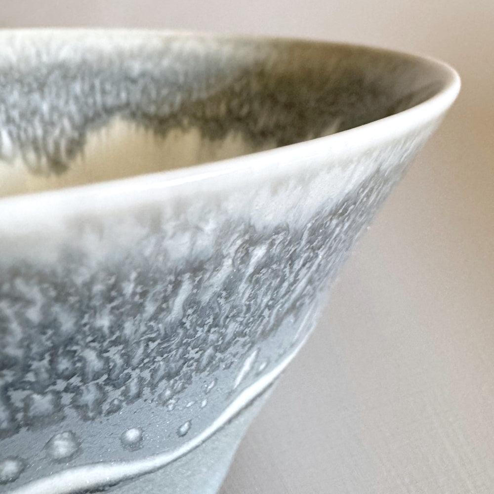 Icicle medium bowl: Crafted by Sinkogama in Mino, Gifu, Japan. Unique glaze captures nature's beauty. Elevate your space with this handcrafted masterpiece.