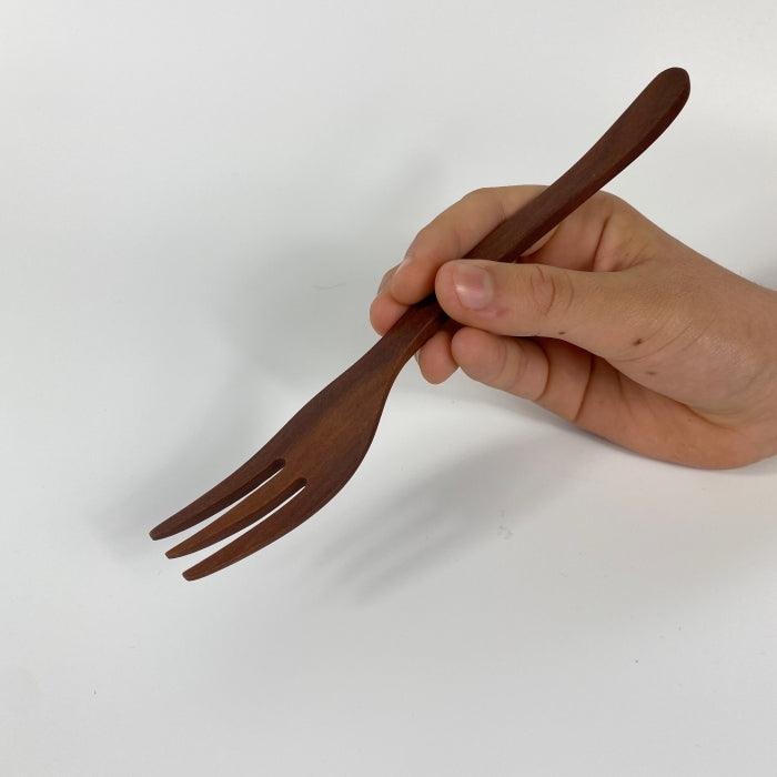 Natural wooden simple table fork from Toka Ceramics.