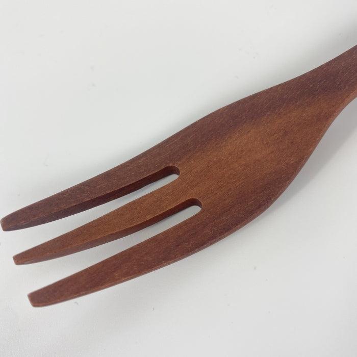 Natural wooden simple table fork from Toka Ceramics.