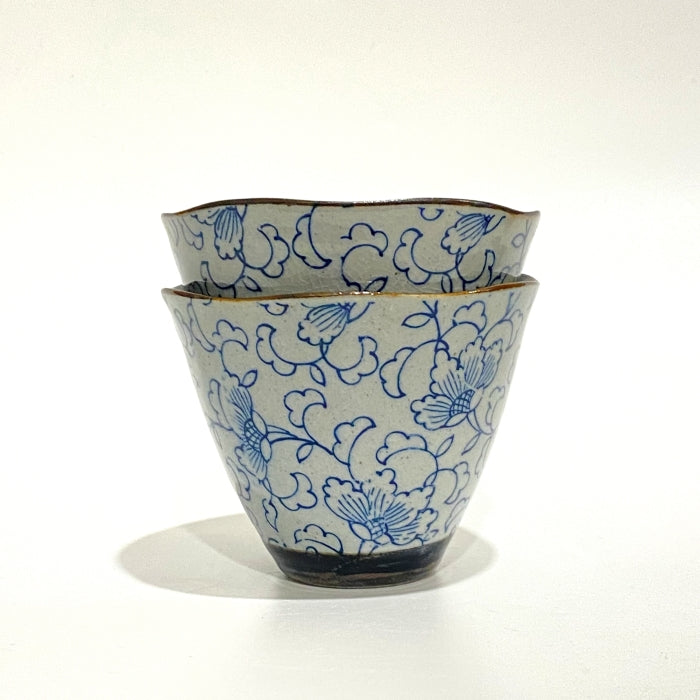 Japanese tea cup in blue floral pattern. Mino ware, made in Japan. Available at Toka Ceramics.